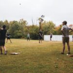 people playing golf during daytime